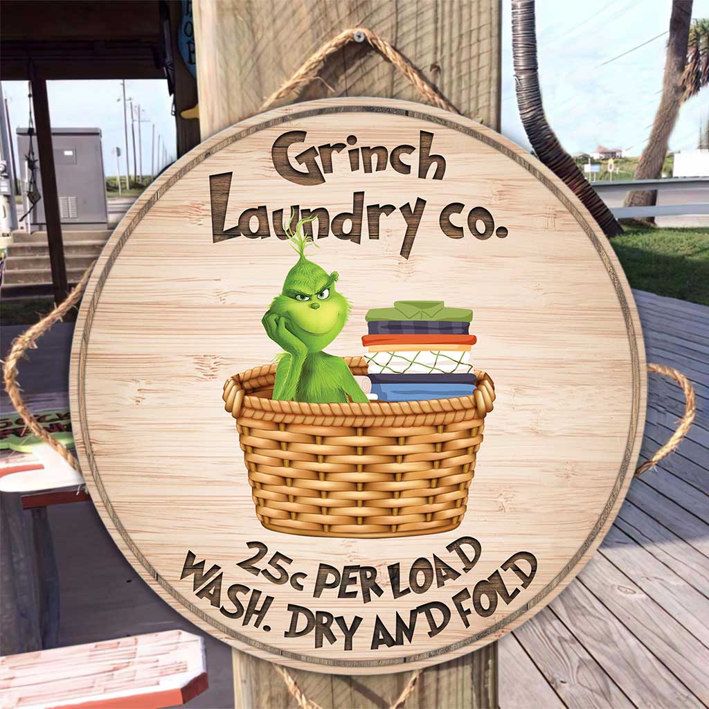 Laundry Co - Panneau rond en bois « Noël volé »