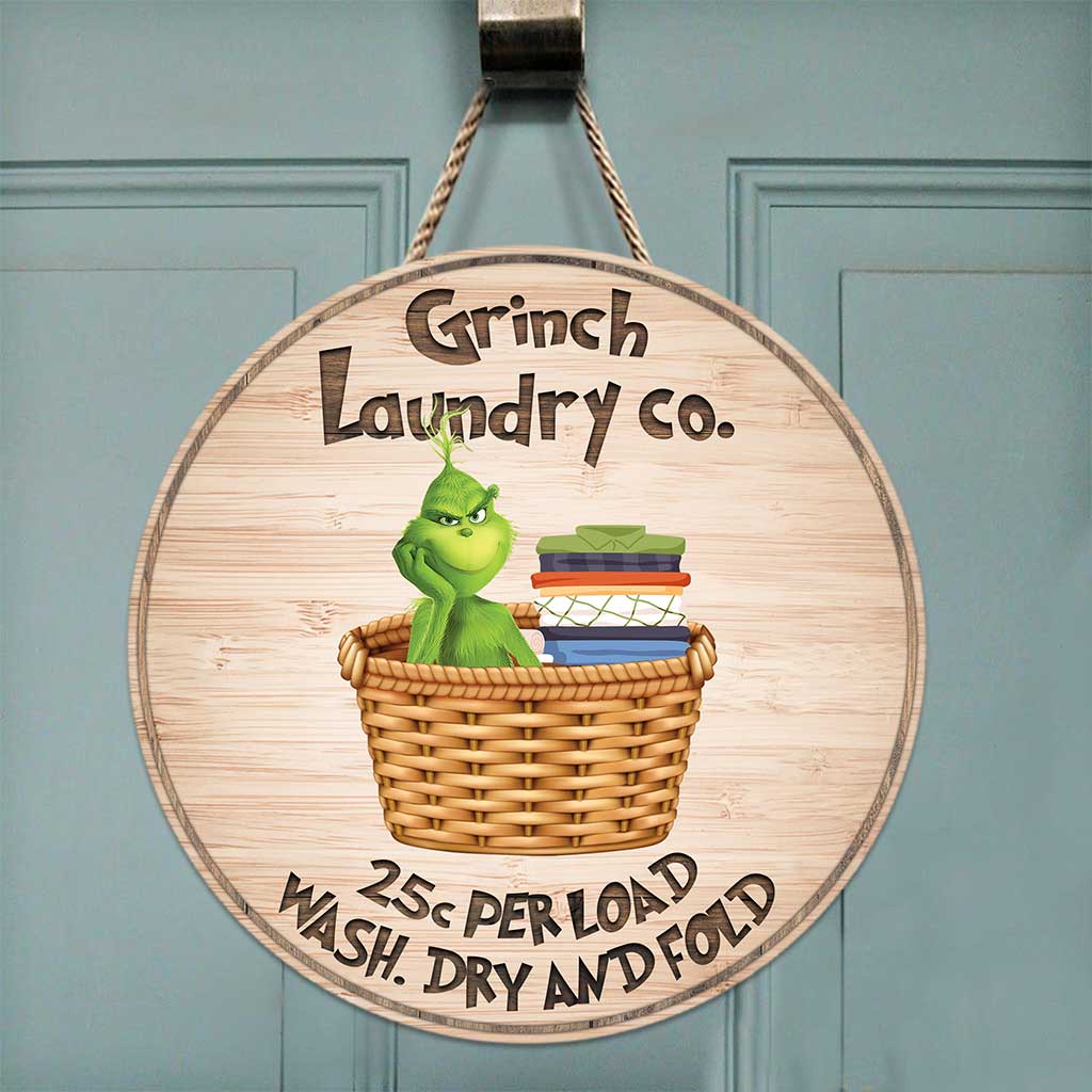 Laundry Co - Panneau rond en bois « Noël volé »